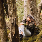 young-woman-with-camera-nature_23-2148192728